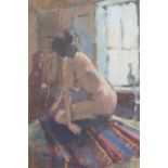 Eric Ward (b. 1945) - Female nude in a sunlit studio with the artist beside his easel in the