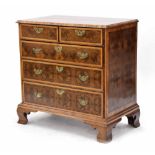 Good William & Mary laburnum oyster veneered inlaid chest, the moulded top over two short and