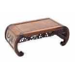 Chinese hardwood 19th century opium table, with foliate carved panelled bowed ends and pierced