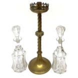 Pair of 19th century fluted glass decanters with hollow stoppers, 12.25" high; together with a brass
