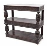 Walnut three tier buffet, incorporating some 16th century timbers, the three tiers united by foliate