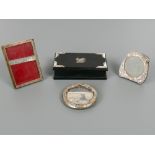 Three small antique silver photograph frames, the largest 3.75" x 2.5" (two at fault); together with