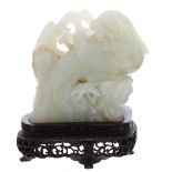 Good Chinese mutton jade carving of a bird and branch, mounted upon a fine pierced carved hardwood
