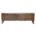 Interesting and rare long boarded oak coffer, probably 16th century and dated '1527',