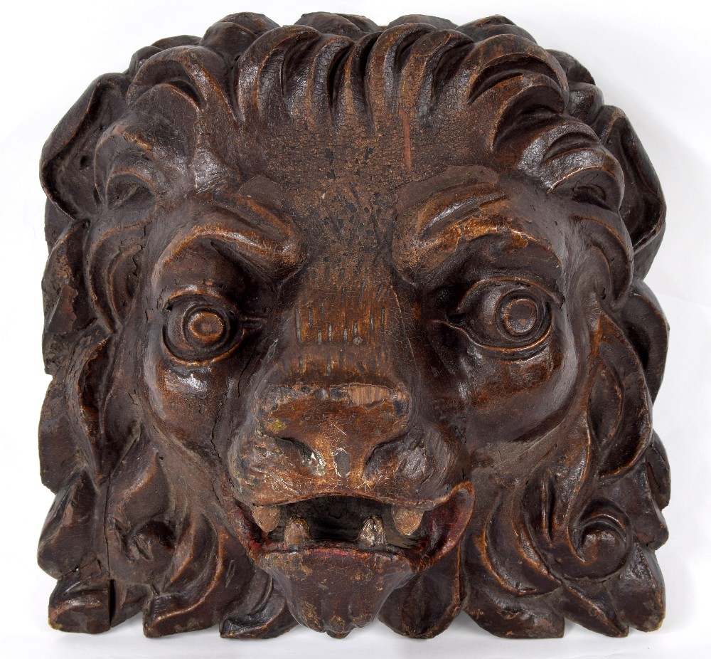 Interesting 17th/18th century carved lion mask, parcel polychrome decorated, 11" high, 12" wide