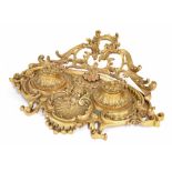 Rococo style gilt bronze ink stand, with two covered ink wells (one glass liner missing), 15.5"