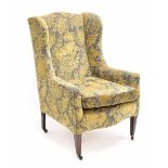 Georgian style upholstered wing armchair upon tapering from supports, 28" wide, 29" deep, 41" high