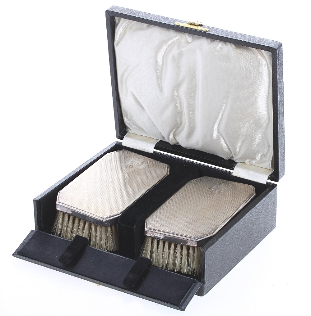 Art Deco cased pair of silver engine turned brushes, maker John Rose, Birmingham 1936, monogrammed