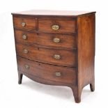 Regency mahogany bow front chest of drawers, the plain top over two short and three long graduated