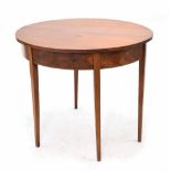 Victorian mahogany circular foldover tea table, supported upon square tapering legs inlaid with