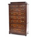 19th century walnut and crossbanded tallboy, the moulded caddy top over seven long graduated