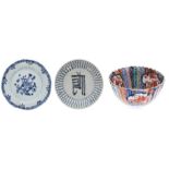 Imari pattern porcelain fluted circular, with floral reserves in typical palette, bearing