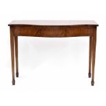 Gill & Reigate of London mahogany serpentine serving table, the plain shaped top over single long