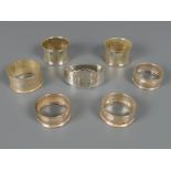 Three matching silver napkin rings, Charles Horner, Chester 1924; together with four further