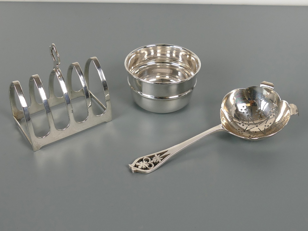 Silver four slice toast rack, 3" long, maker Emile Viner, Sheffield 1932; together with a pierced