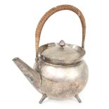 H. Wilkinson silver plated tea pot in the manner of Christopher Dresser, with wicker wrapped