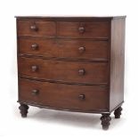 Victorian mahogany bow front chest of drawers, the plain top over two short and three long graduated