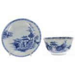 Chinese Nanking Cargo blue and white porcelain tea bowl and saucer, decorated with a pagoda