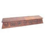 Arts & Crafts oak table top compartment, with two folding hinged covers over the stylised carved