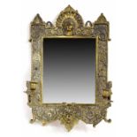 Aesthetic Egyptian revival gilt metal girandole, the cast frame surmounted with a female bust within