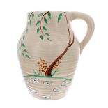 Clarice Cliff small Isis vase/jug, painted with a leaved tree over white flower heads, 8" high (