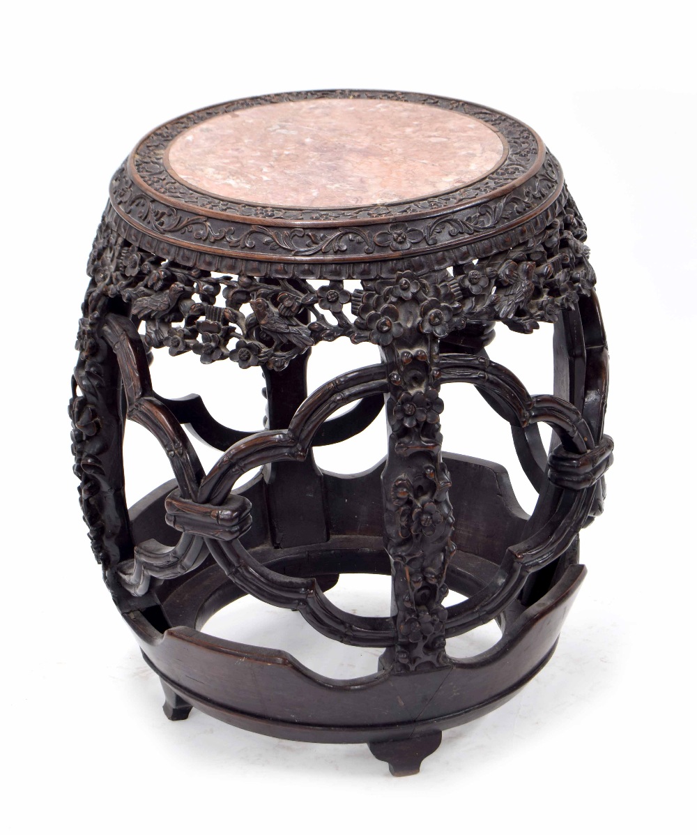 Good Chinese hardwood barrel shaped side table, the pink marble top within a continuous band of