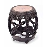 Good Chinese hardwood barrel shaped side table, the pink marble top within a continuous band of