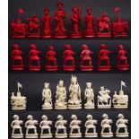 Indian stained and natural ivory figural part chess set, missing white horse and red pawn (at fault,