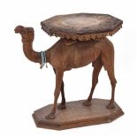 Eastern 19th century novelty carved hardwood camel side table, the octagonal top carved with dragons