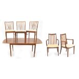 Peter Hayward for Vanson mid century extending dining table and three stick back dining chairs;