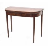 Georgian mahogany foldover card table, the foldover top with inlaind banding, enclosing green