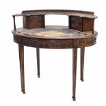 Unusual Victorian oak oval writing table, the raised top with an egg and dart carved frieze over a