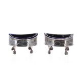 Pair of George III silver oval salts with blue glass liners, with engraved swag decoration around