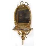 Circa 1800 Regency giltwood gesso oval wall mirror, the rope twist and tassle moulded frame and