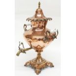 19th century copper samovar, twin-handled, with brass tap and finial, 21" high