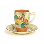 Clarice Cliff Bizarre Lynton cup and saucer, painted with flowers within circular bands, the cup