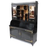 Aesthetic Movement ebonised collectors cabinet attributed to Collinson & Lock, the centre raised