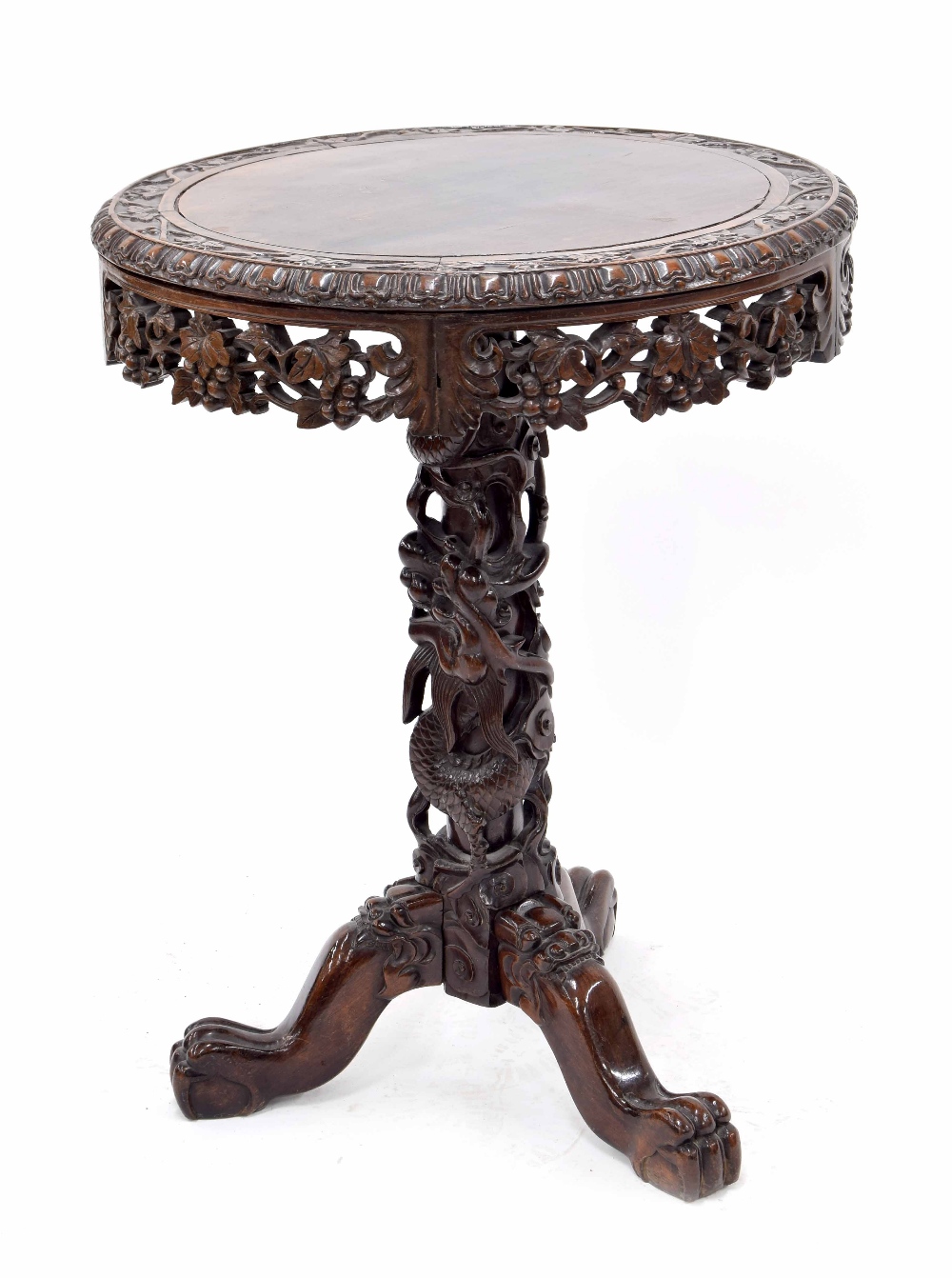 Chinese hardwood circular occasional table, the top carved with a continuous band of fruiting