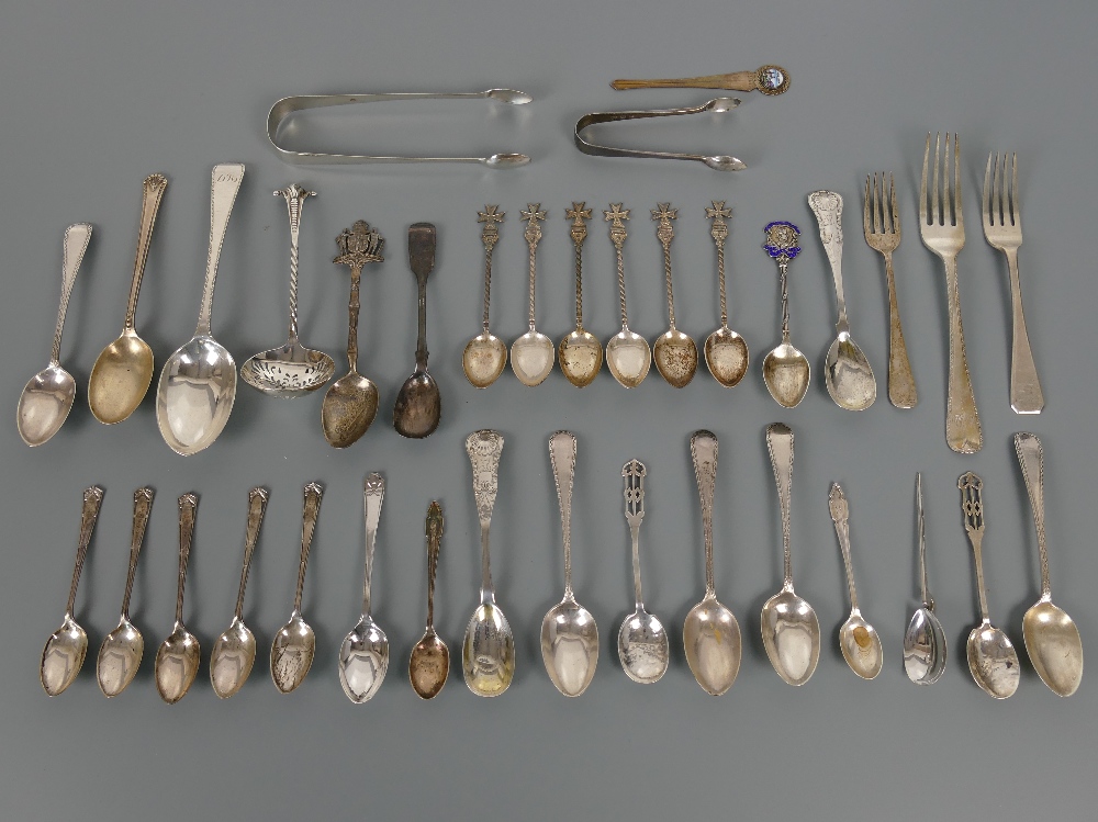 Mixed lot of antique and vintage silver items including spoons, tongs, sifter spoon, bookmark etc,