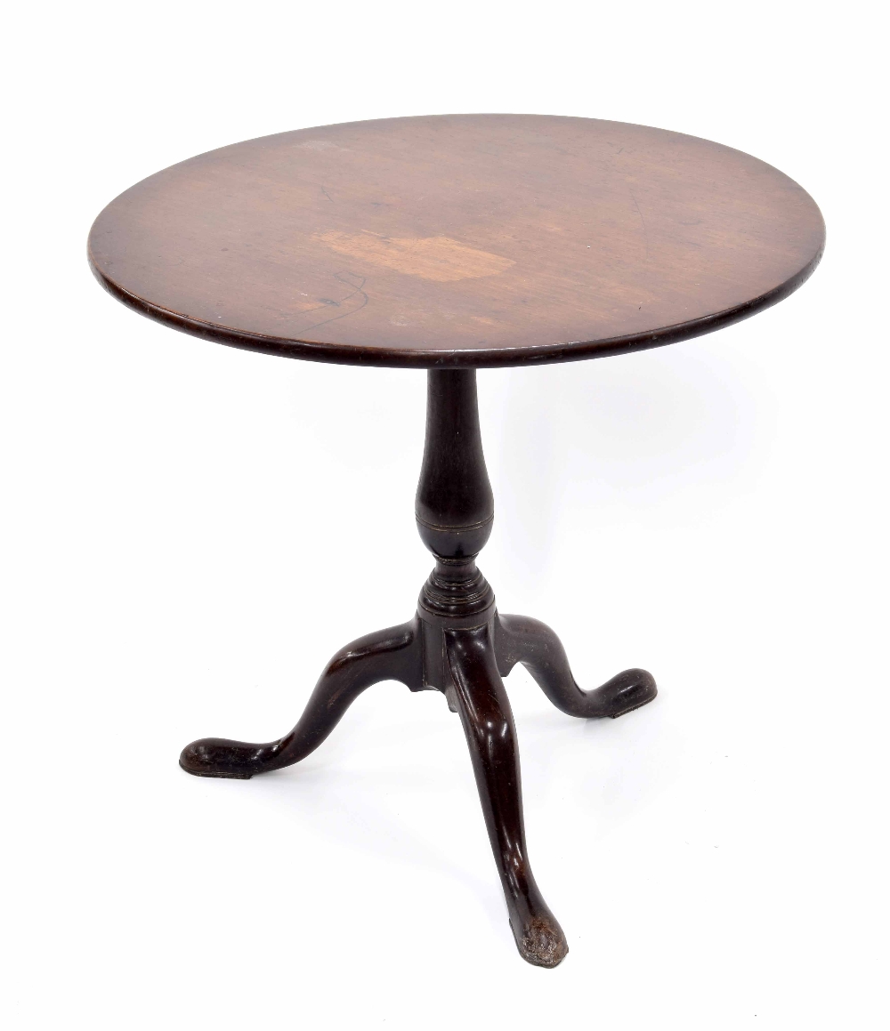 Georgian mahogany circular tilt top tripod table, the plain top on a slender turned support and