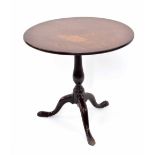 Georgian mahogany circular tilt top tripod table, the plain top on a slender turned support and