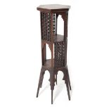 Moorish style walnut hexagonal three tier plant stand in the manner of Liberty, 13" wide, 40.5" high