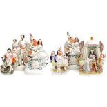 Collection of six Victorian Staffordshire flatback pottery figural groups including three clock