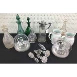 Art Nouveau silver plated and glass claret jug, the mount cast with a stylised maiden's head and