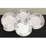 Set of six vintage Rorstrand Sweden ceramic side plates, with raised moulded floral decoration to