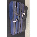 Three half size violin cases with outer zip covers (3)