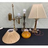 Three table lamps including a vintage brass counterbalanced lamp, 22" high, a painted turned