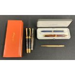 S T Dupont ballpoint pen, box af; together with a Parker ballpoint pen, silver gilt Yard-O-Led,