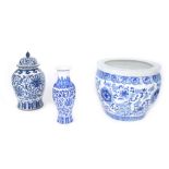 Decorative Chinese blue and white porcelain jardiniere decorated with foliage, modern, 12" high;