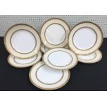 Set of eight Booths for T Goode & Co. china plates, decorated with arching gilt rim borders, 9.5"